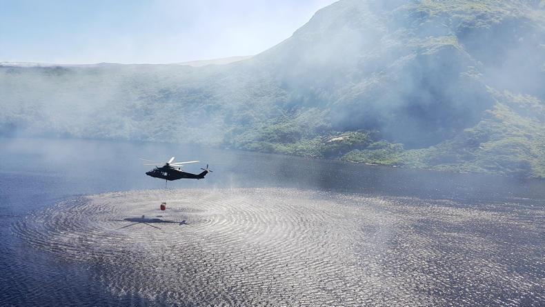 Air Corps called in to fight wildfires Air Corps called in to fight wildfires